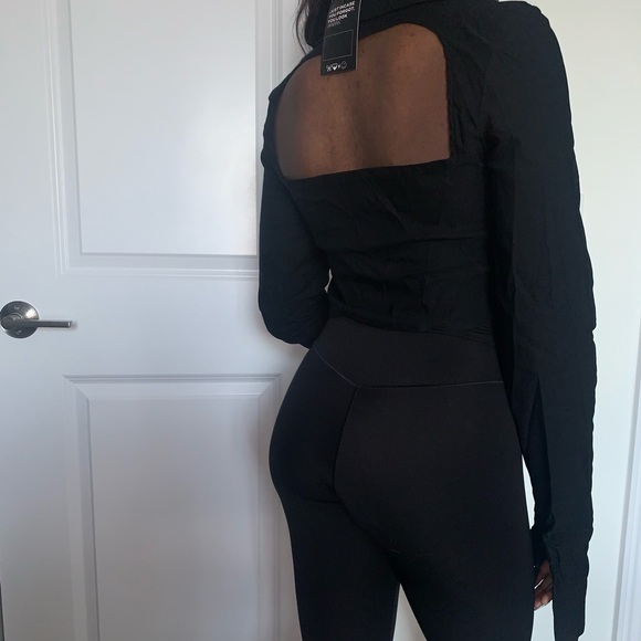 SOLADO Cut Out Asymmetrical Hem Long Sleeve Top - Picture 5 of 6